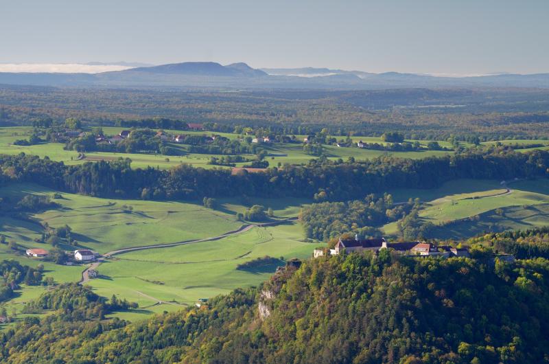 Typical landscape in the Jura mountains with grassland and forests (near Salins-les-Bains).